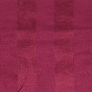 May include: A close-up of a deep burgundy fabric with a subtle striped pattern. The fabric has a smooth, slightly textured surface.