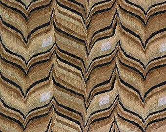 May include: A fabric with a chevron pattern in shades of brown, black, and white. The fabric has a subtle sheen and a textured surface.
