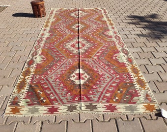 Vintage Turkish Kilim Rug: Handwoven Nomadic Design (4.56x10.04 ft)
