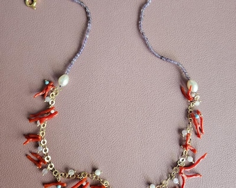 Dainty necklace with red coral