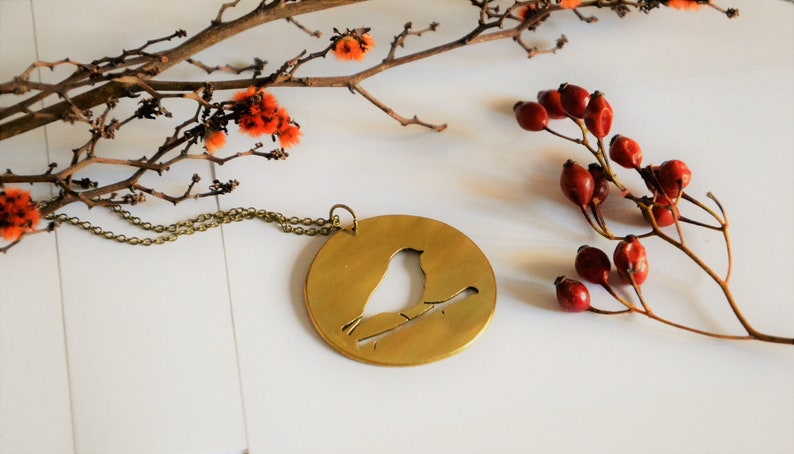 Bird on branch pendant necklace bronze