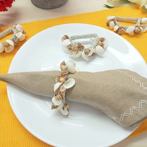 Set aus 4 Muscheln Perlen Serviettenringen