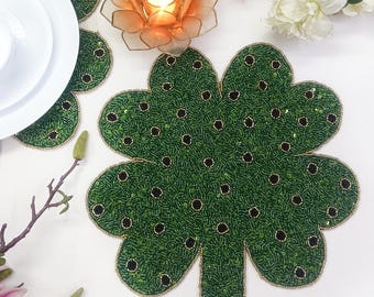 Green Clover Leaf Handmade Beaded Placemat with black dots.