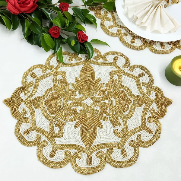 Handmade off-white and gold ornate design beaded oval placemat