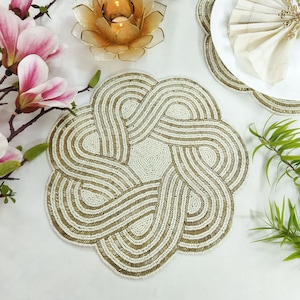 Handmade white and gold beaded table placemats