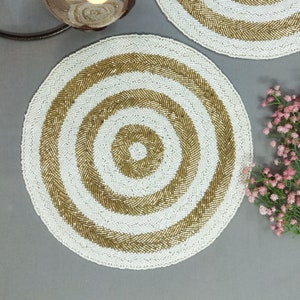 Handmade white and gold beaded table placemats