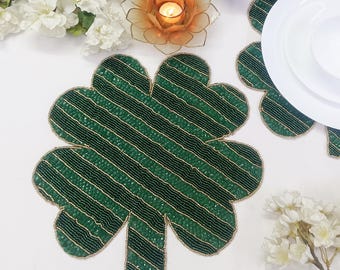 Green Clover Leaf Handmade Beaded Placemat with black dots.