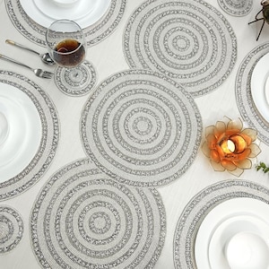 Handmade Off-white and Silver Beaded Table runner. Matching placemats and coasters are also available.