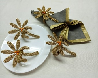 Ensemble de 4 anneaux de serviette perlés de palmier d’or