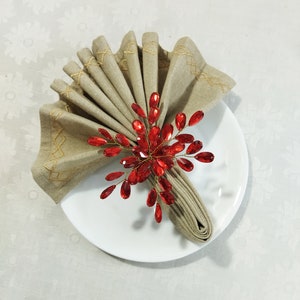 Set di 4 anelli per tovaglioli con perline rosse