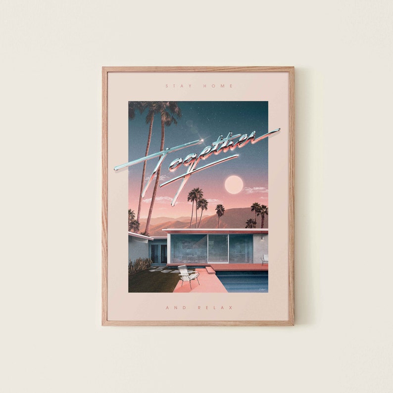May include: A framed print with a retro-style illustration of a house with a pool and palm trees. The text "STAY HOME TOGETHER AND RELAX" is printed in the bottom of the image.