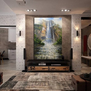 May include: A large painting of a waterfall cascading down a rocky cliffside, surrounded by lush green foliage. The painting is displayed on a wall in a modern living room with a black entertainment center and a rug.