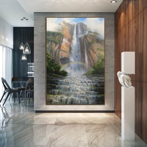 May include: A painting of a waterfall cascading down a rocky cliff with a rainbow arching over the water. The scene is set in a lush green forest with a blue sky in the background.