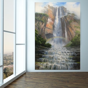 May include: A painting of a large waterfall cascading down a rocky cliff face. A rainbow arches over the waterfall, which is surrounded by lush green foliage.