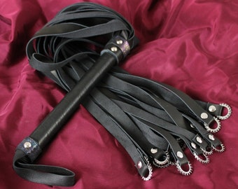 BDSM vampire flogger, steel rings and leather