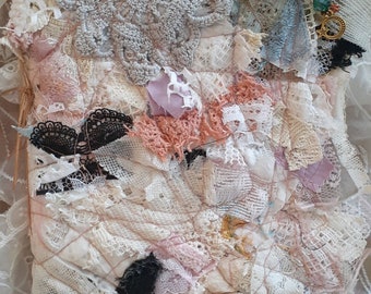 Lacy Soft - Cover made of lace remnants, fabrics, Beads, and is a writting junk journal.