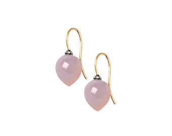 May include: A pair of gold earrings with pink gemstone drops and black diamond accents.