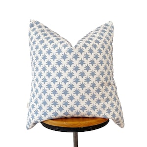 Blue and white floral pillow cover.