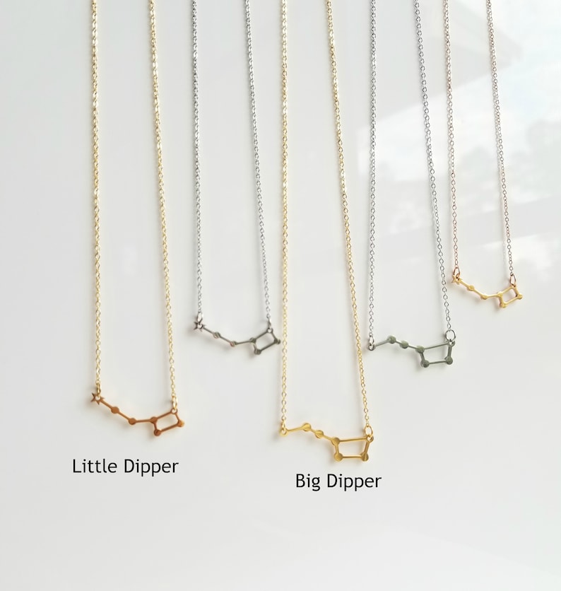 May include: Five gold, silver, and rose gold necklaces with a constellation design. The necklaces feature the Little Dipper and Big Dipper constellations.