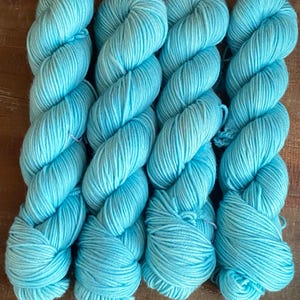 Hand Dyed Speckled DK Yarn: 100% Superwash Merino Wool