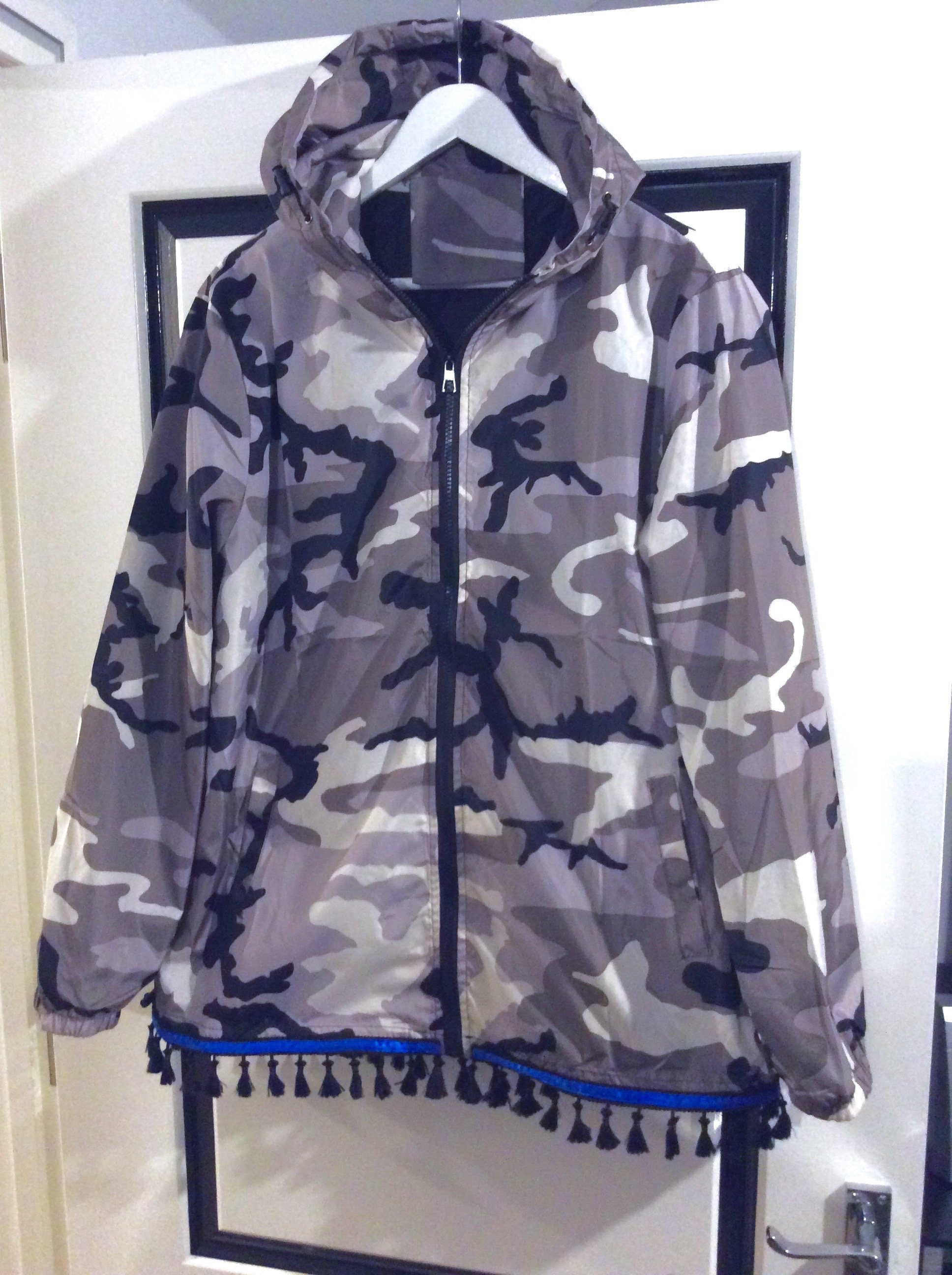 Image of Men’S Hebrew Israelite 100 Percent Polyester Grey Camo Hooded Windbreaker Jacket With Black Tassel Fringes & A Satin Ribbon Of Blue