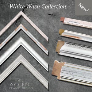 May include: A collection of White Wash picture frame molding samples. The display includes four angled corner pieces and four straight linear segments in various white, off-white, and distressed wood finishes with visible brown undertones.