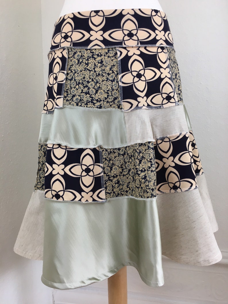 Easy to wear with stretchy pull on waistband. Stunning asymmetrical skirt linen light sage green and navy blue retro print patchwork