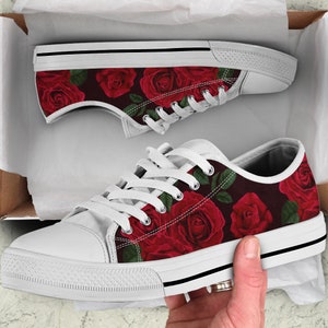 black shoes with flowers on them