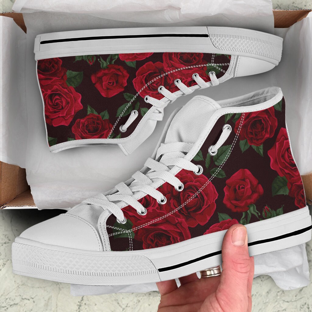 black shoes with flowers on them