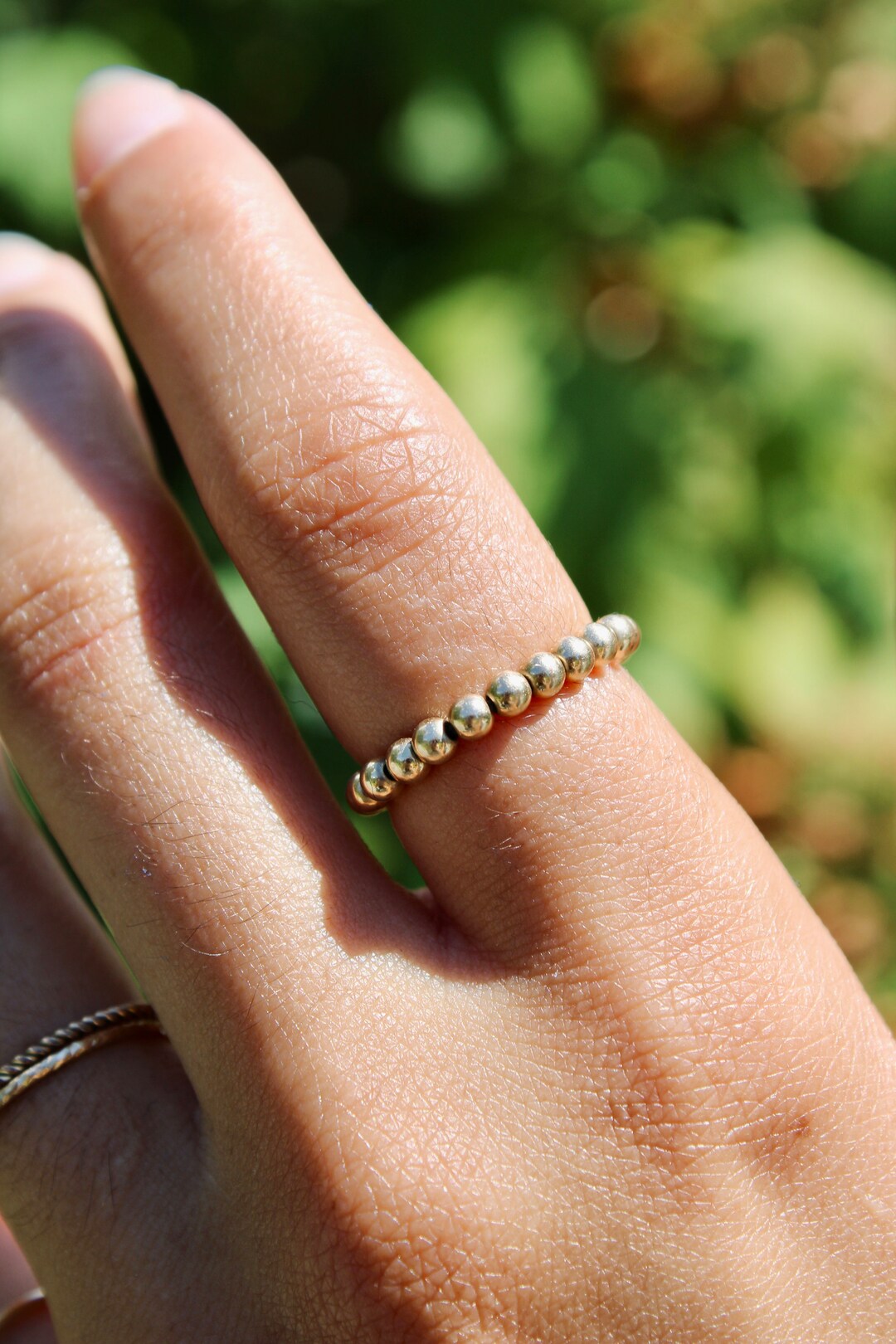 Anello impilabile con corda intrecciata. Anello impilabile