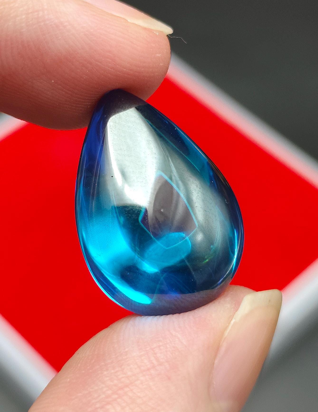 Power Mystic Blue Droplet Naga Eye Crystal Gemstone Charm