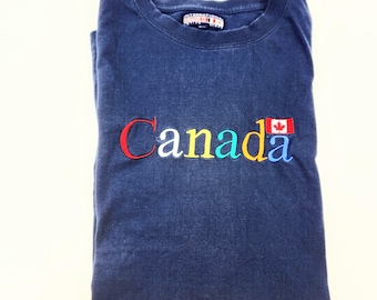 Canada T-Shirt, XL Navy Short Sleeve Cotton T International Active Sport, 48&quot; Chest by 30&quot; Long Vintage T Shirt in Good Condition