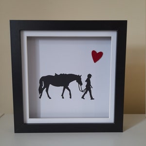 Horse and rider with a felt heart in a black box frame by Sarah Sample Art