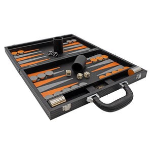 May include: A black backgammon set with orange and gray accents. The set includes dice, checkers, and a carrying handle. The board is open, revealing the playing surface with its distinctive triangular points.