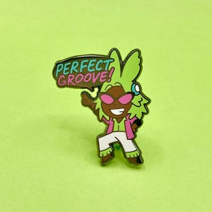 tanzender grüner Emaille Pin