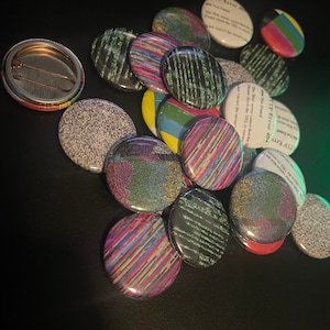 May include: A collection of colorful and patterned buttons with various designs, including stripes, pixelated patterns, and text. The text on the buttons reads "ITP Error 404" and "The Web server cannot find the file you are looking for. Please check the URL to make sure it is correct or contact the server to report the problem."