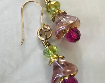 Gold luster petite flower blossom earrings.