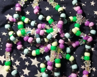 Bracelets Toric Pride à bordure étoile Kandi