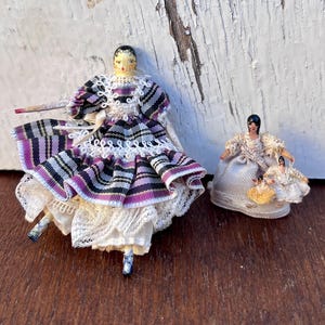 Colección de muñecas de madera hechas a mano: Arte en miniatura