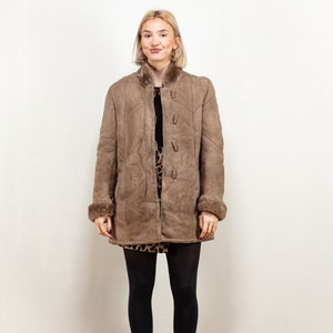 Manteau gris en peau de mouton pour femme manteau vintage des années 70 en peau de mouton retournée manteau d'hiver manteau court en peau de mouton femme vêtements vintage taille moyenne