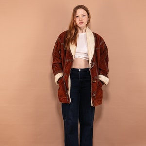 Pig skin coat top