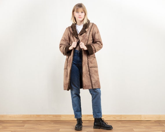 Manteau long imitation daim femme sale