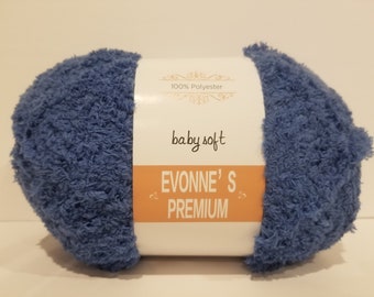May include: A skein of blue baby soft yarn, labeled "Evonne's Premium" and "100% Polyester".