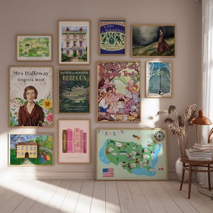 May include: A wall gallery featuring framed prints of book covers, including "Mrs. Dalloway" by Virginia Woolf, "Rebecca" by Daphne du Maurier, and "The Talk of the Town" by  Captain Corelli's Mandolin. The gallery also includes a map of the United States, a vintage illustration of a house, and a vintage illustration of a street lamp.