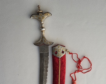 Vintage Indo Persian, mughal gold and silver koftgari chillanun khanjar knife with scabbard and chape and locket.