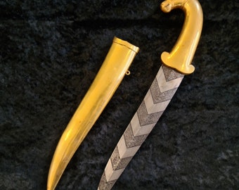Vintage Royal Indian, Indo Persian, Mughal horse face dagger with gold foil plating and chevron Damascus blade.