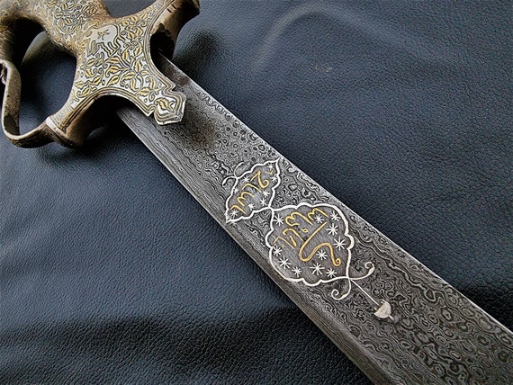 Indo persian vintage tiger head hilt islamic sword sh… - Gem