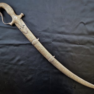 Indo persian vintage tiger head hilt islamic sword shamshir with damascus blade with silver and gold koftgari work, and sheath