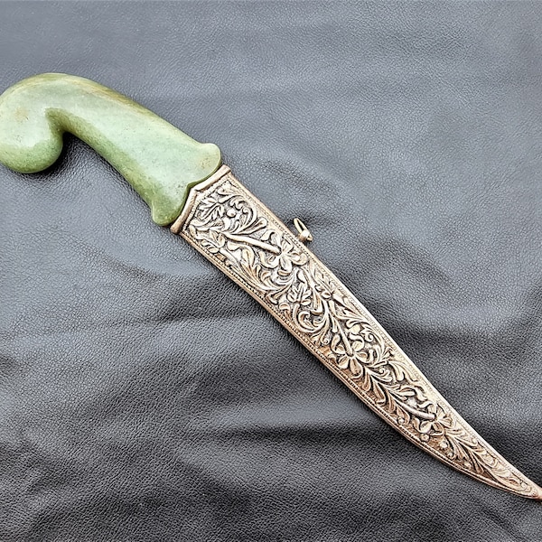 Vintage indo persian mughal rajput jade dagger khanjar knife with german silver chiseled sheath and gold koftgari blade.