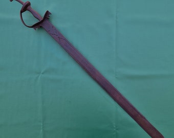 Vintage khanda sword talwar with engraved design on hilt and the blade.